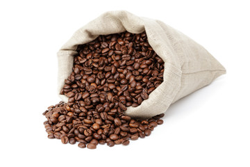 roated coffee beans spill out of the bag