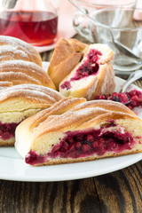 Baked cowberry pie in white dish