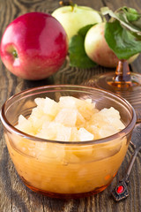 Homemade apple jam on  wooden board