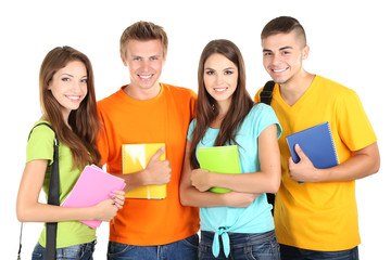 Happy group of beautiful young students, isolated on white