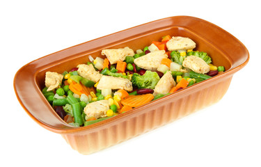 Casserole with vegetables and meat, isolated on white