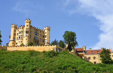 View to Castle Hohnschwangau a tourist attraction in Bavaria - Blick zum Schloss Hohnschwangau in Bayern - obrazy, fototapety, plakaty