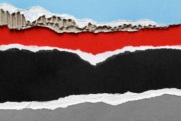 Blue, red, black and gray ripped papers background