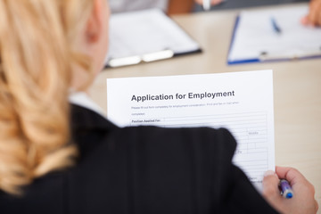 Businesswoman Holding Application Form