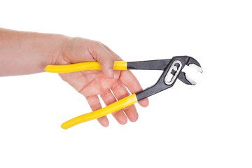 Hand Holding Pliers With Yellow Grips