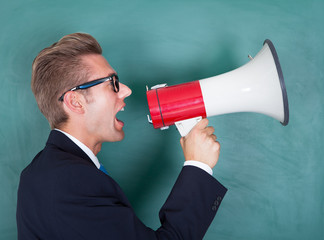 Male Professor Shouting Though Megaphone