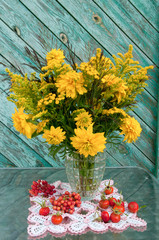 still life bouquet of yellow flowers