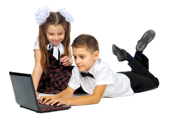 a boy, a girl and a laptop