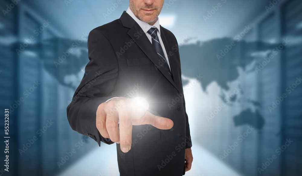 Poster Businessman touching futuristic interface with world map on back