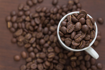 Coffee bean in white cup