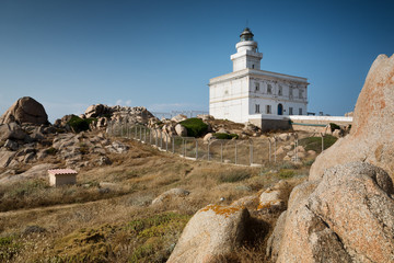 Fototapeta na wymiar Lighthouse at the Capo Testa, Sardinia, Italy