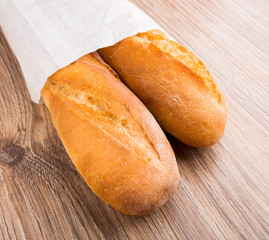 Baguette in paper bag