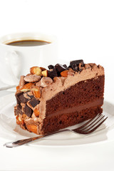 Sweet chocolate cake topping almond nut with coffee