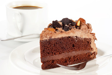 Sweet chocolate cake topping almond nut with coffee