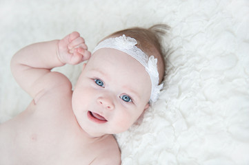 portrait of beautiful baby on white background