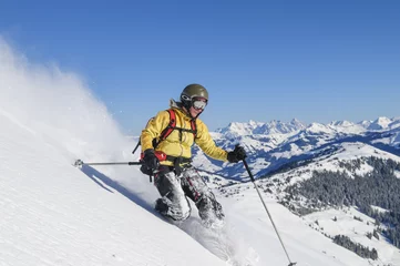 Fotobehang Skifahrerin vor herrlicher Kulisse © ARochau