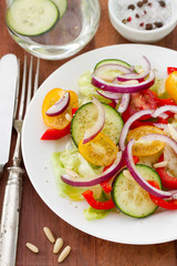 vegetable salad with nuts on plate