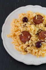 sausages with rice on the plate