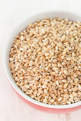 pearl barley in red bowl