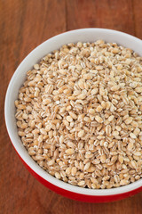 pearl barley in red bowl