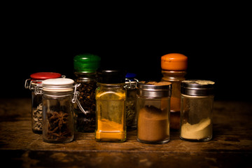 Selection of spices in rustic setting © LoloStock