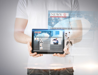 man showing tablet pc with news