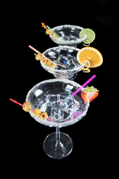 Martini drinks isolated on black background