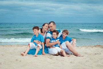 Young family with three kids on vacation