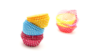 Stack of colorful cupcake cases