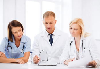 team or group of doctors on meeting