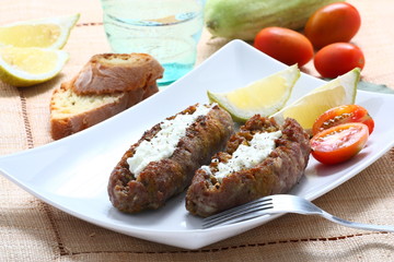 Salsiccia arrosto e tzatziki