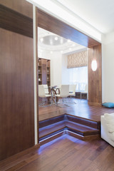 Dining room with a round glass table in the middle