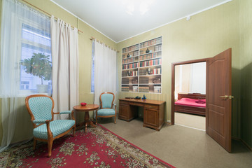 Interior room sitting area with two chairs