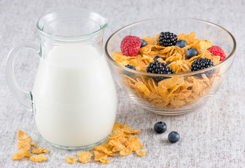 Healthy breakfast with milk and fresh fruit and cereals