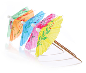 Multicolored Cocktail Umbrellas. Simmer symbol, isolated