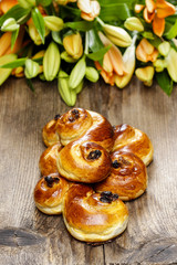Traditional swedish buns in autumn setting. A saffron bun