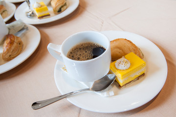black coffee and cake in coffee break