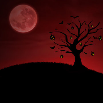 Red halloween pumpkin tree under moon