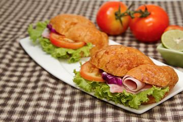 fresh morning breafast ,croissant ham  sandwich