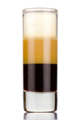 Shot three layers alcohol cocktail isolated on white