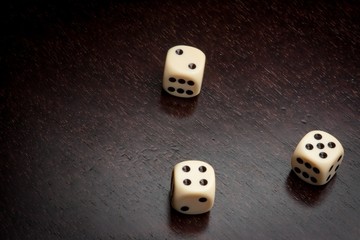 dice on old wood table