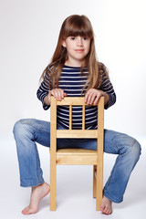Cool girl sitting on a chair
