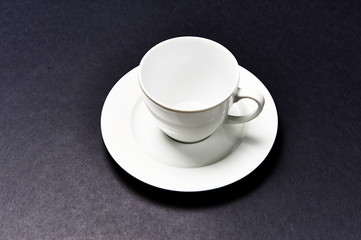 Coffee cup on a dish