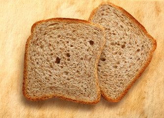 Bread slices on paper background