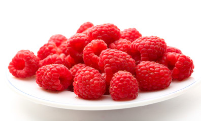Fresh raspberry on white plate