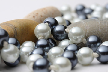 String of black and white pearls with stones