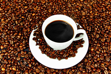 Steaming hot cup of black coffee