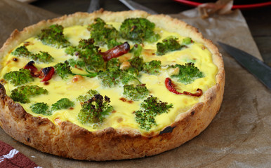 round cake with broccoli and cream