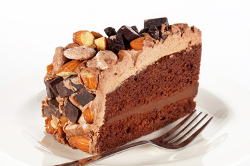Sweet chocolate cake topping with chocolate and almond nut