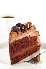 Sweet chocolate cake topping almond nut with coffee